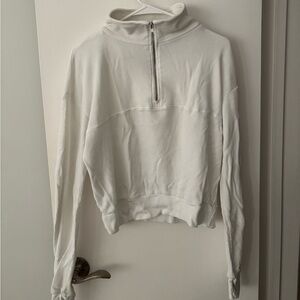 Brandy Melville white quarter-zip crew